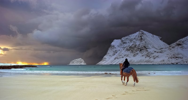 Pferdereiten am Strand